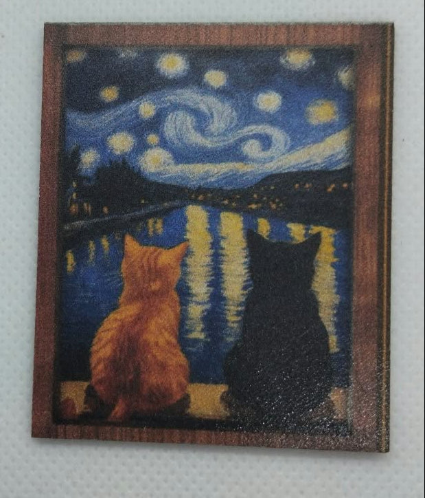 miniature picture of a starry night with two cats watching on a white background.