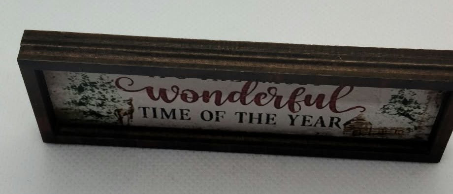 christmas decor sign in miniature on a white background